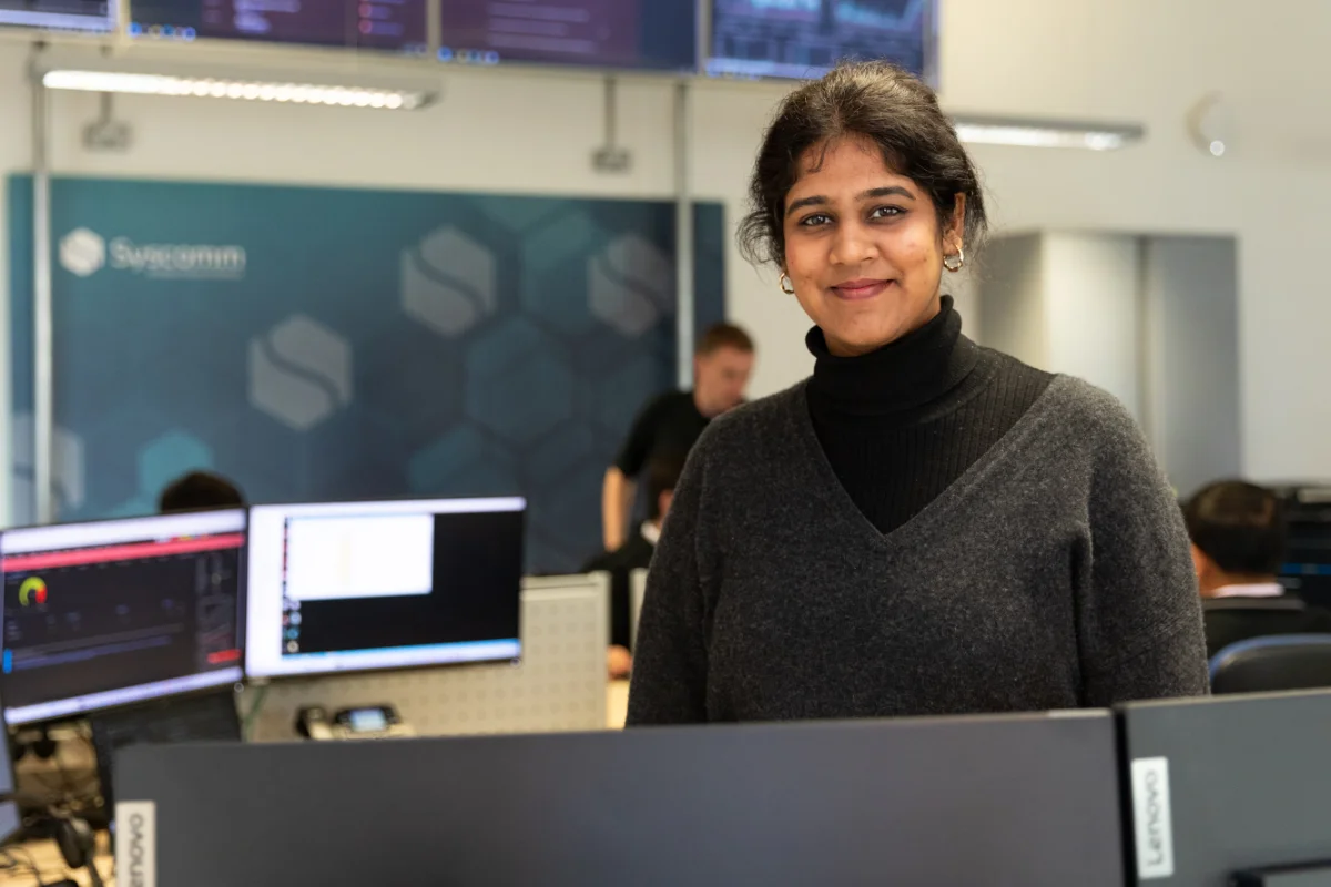 syscom team member in the office